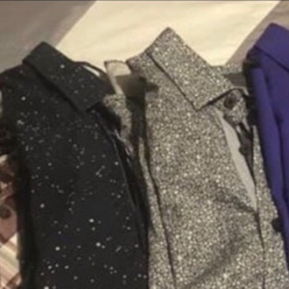 Eight X shirts